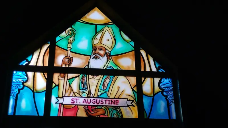 St Augustine stained glass window